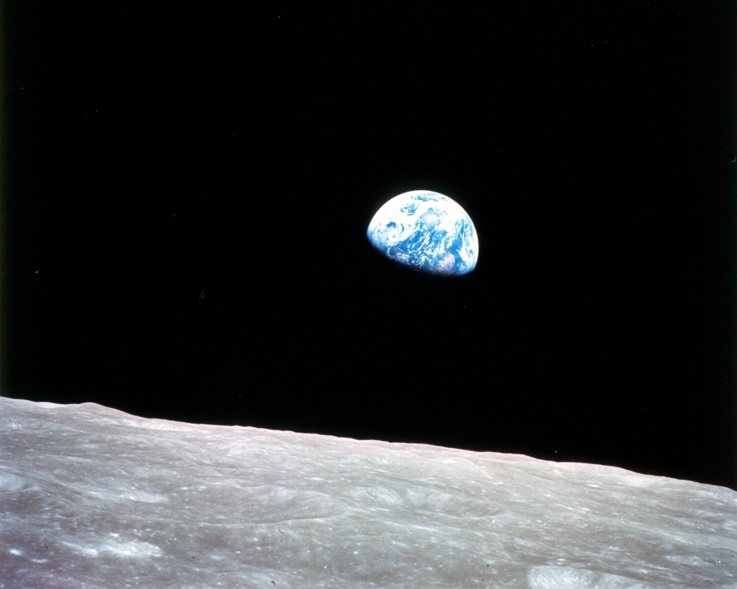  - Mother Earth rising, as seen from Mother Moon. (Photo Credit: NASA)